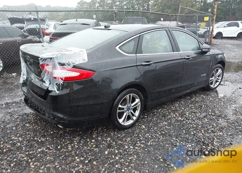 2015 Ford Fusion Hybrid Titanium from USA, damaged, VIN 3FA6P0RU7FR171726